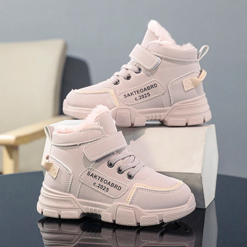 A pair of children's winter velvet warm snow boots with leather waterproof and anti-slip wear-resistant high-top cotton shoes