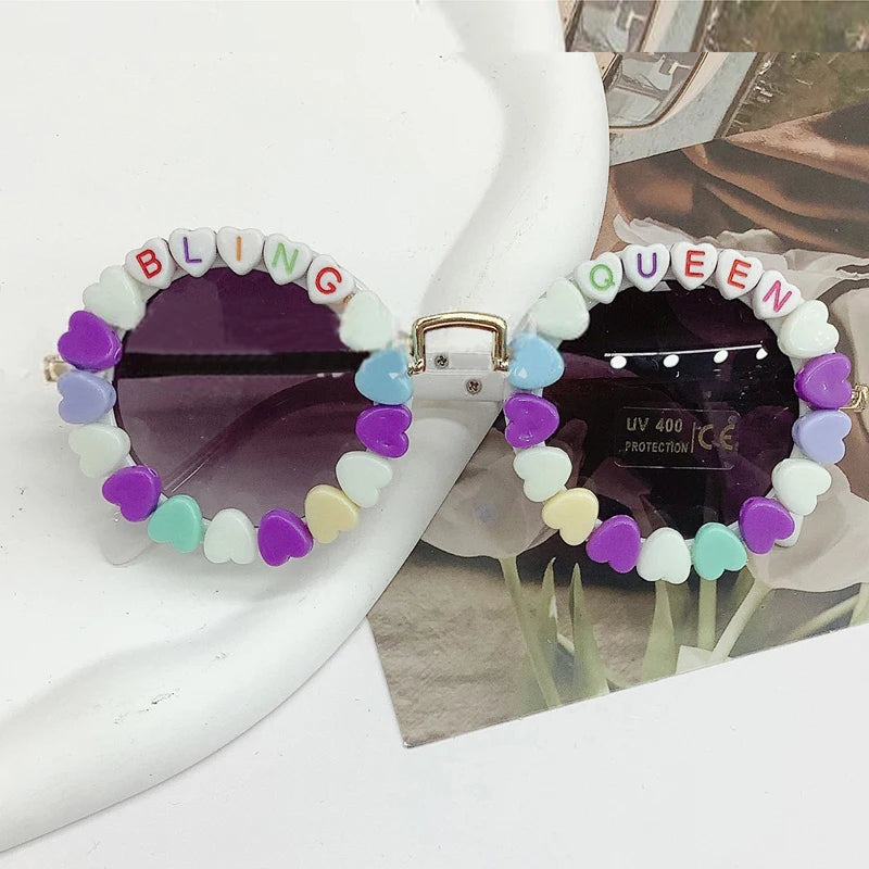 2024-05-10 Lioraitiin Gafas de sol para niños y niñas, gafas ligeras con marco de cuentas, gafas de protección solar para niños pequeños, accesorios para exteriores