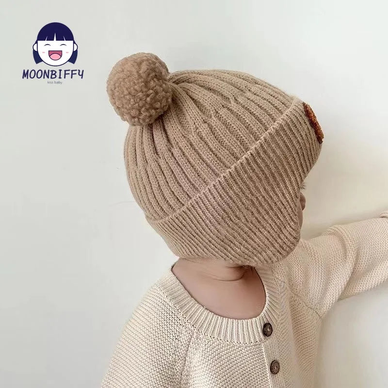 Gorro de invierno para bebé, gorro tejido con protección para la oreja de oso de dibujos animados para niños pequeños, gorros de ganchillo cálidos coreanos para niños y niñas