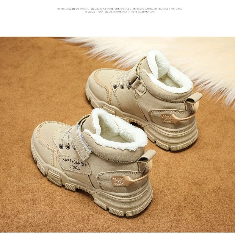 A pair of children's winter velvet warm snow boots with leather waterproof and anti-slip wear-resistant high-top cotton shoes