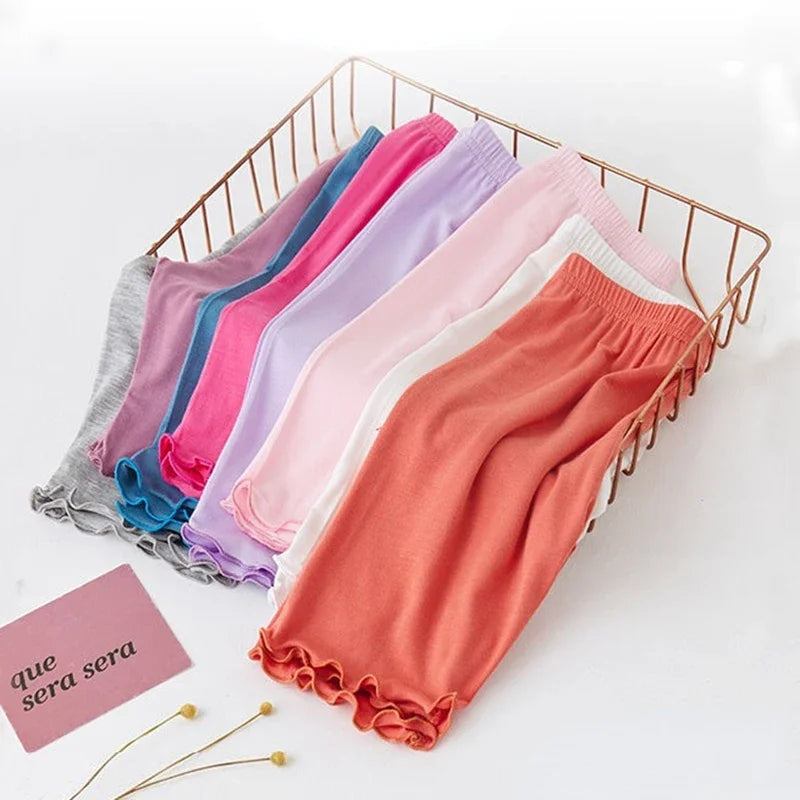 Pantalones de verano para niñas, mallas de algodón Modal hasta la rodilla, pantalones de longitud media, Legging con volantes de Color sólido, ropa para niños de 3 a 10 años