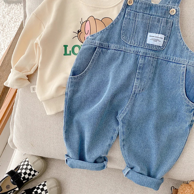 Nuevo Otoño niños Denim mono niño niño niña bolsillo suelto tirantes pantalones largos Jeans moda monos ropa