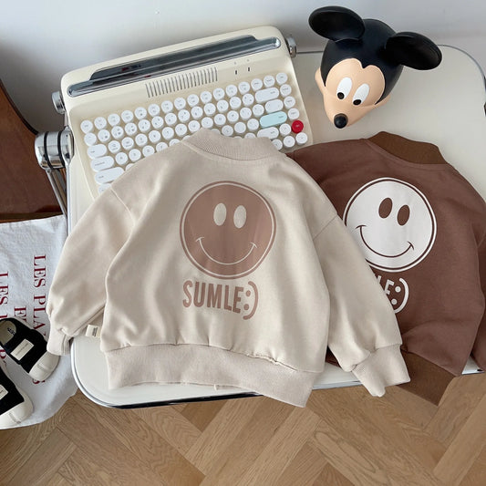 Otoño nuevos niños bebés de un solo pecho con estampado de cara sonriente abrigo superior fresco inspirado en el béisbol uniforme de moda para niños pequeños 0-5Y