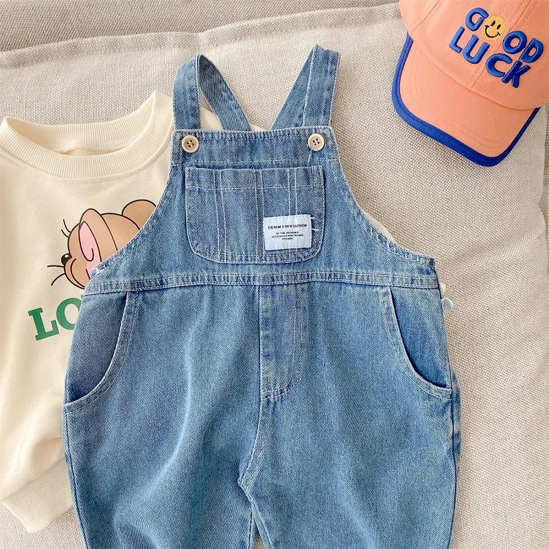 Nuevo Otoño niños Denim mono niño niño niña bolsillo suelto tirantes pantalones largos Jeans moda monos ropa